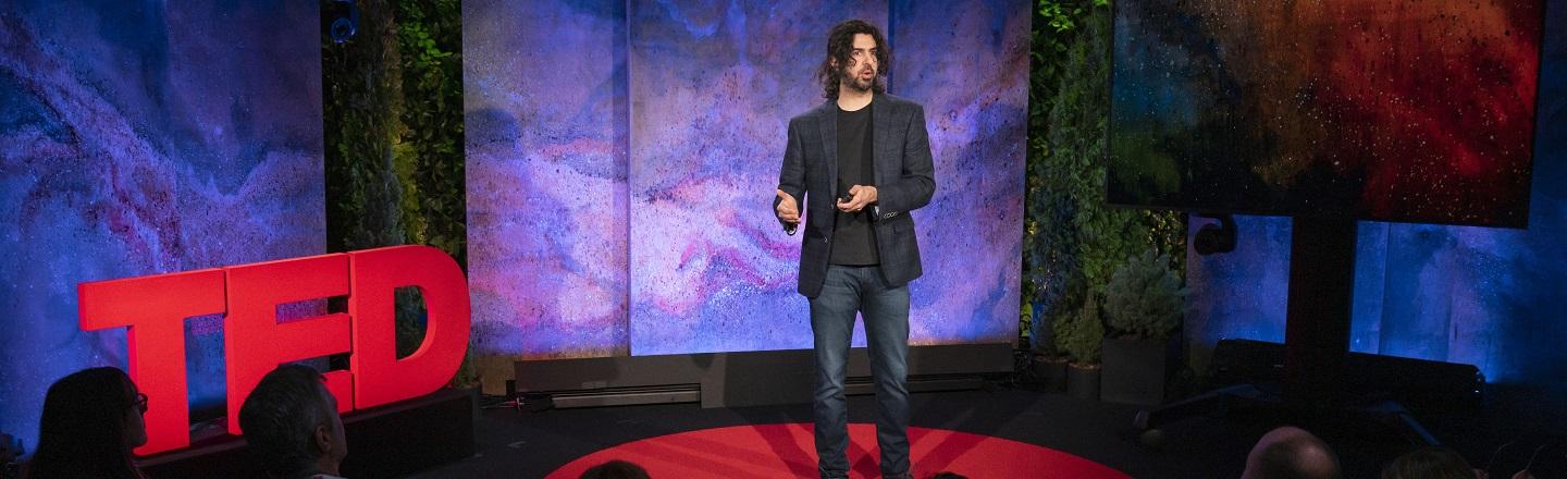 Azim Shariff on stage at the TED Theatre in New York