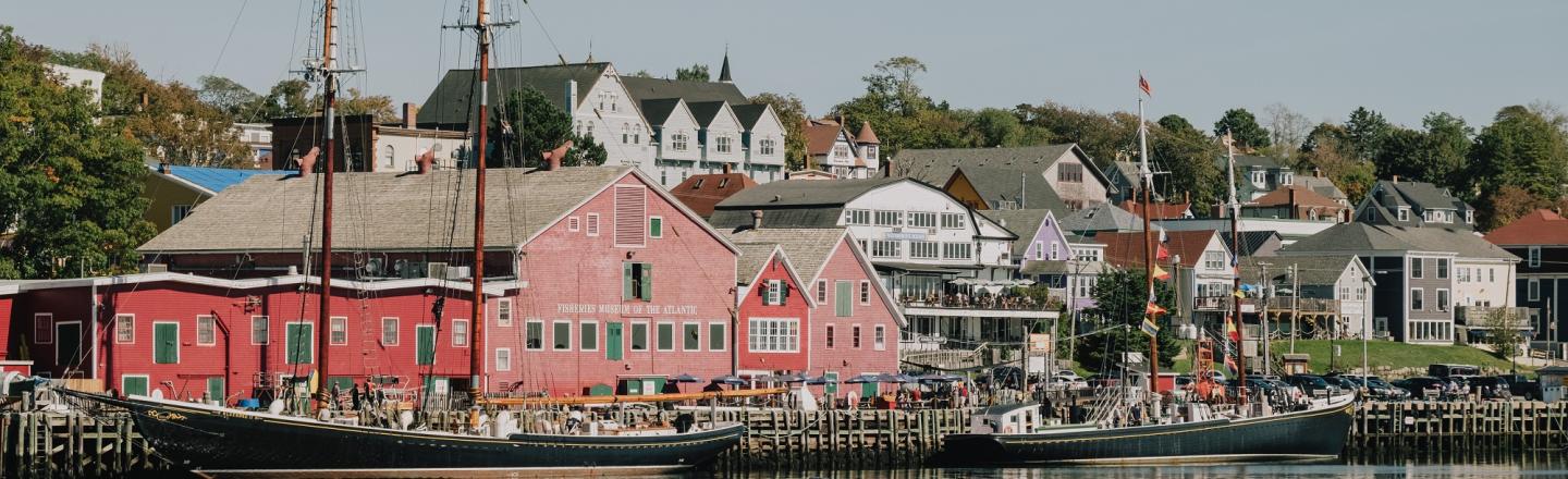 waterfront view of boats and colouful buildings