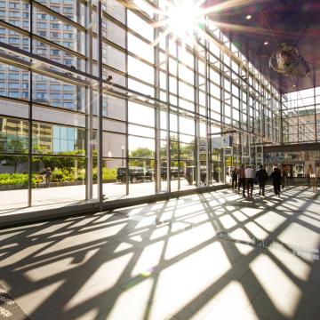 Group of people walking through convention centre